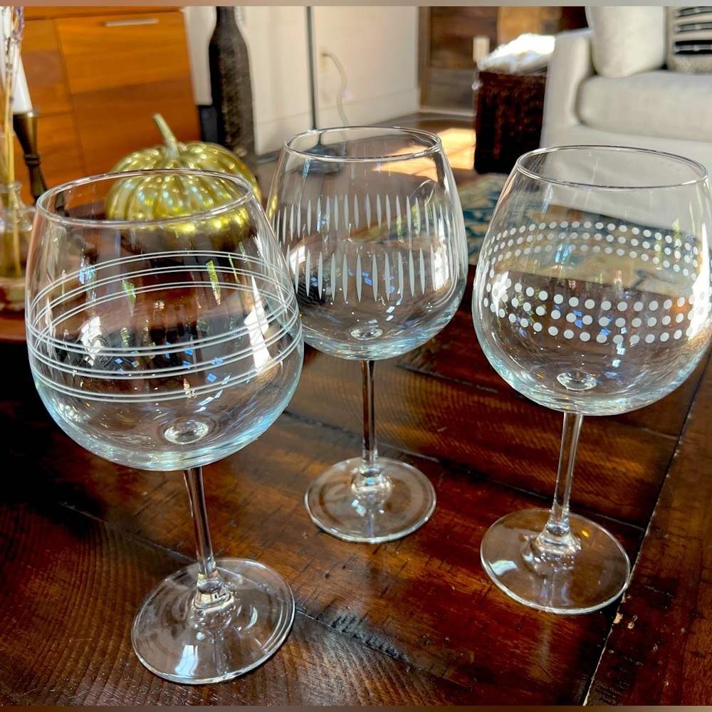Set of 3 globe style red wine glasses with etched patterns​